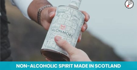 two hands passing a bottle of the non-alcohlic spirit Talonmore